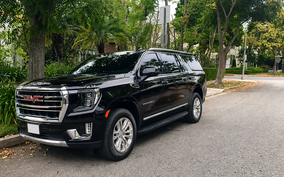 Black GMC Yukon Denali full-size luxury SUV