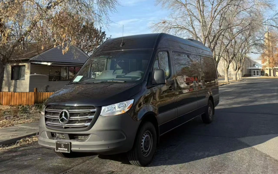 Real black Mercedes-Benz Sprinter passenger van in the Gate & Mile fleet
